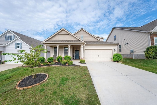 craftsman-style home featuring a garage and a front lawn