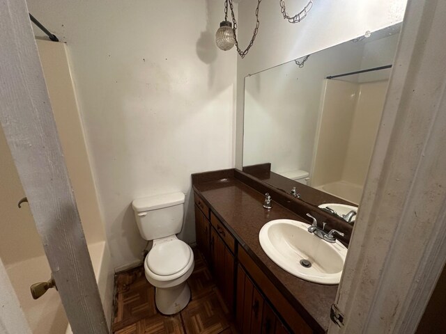 full bathroom featuring vanity, toilet, shower / bath combination, and parquet flooring