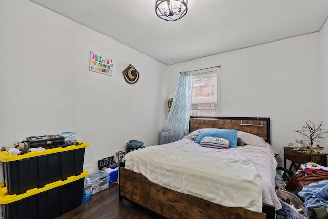 bedroom featuring dark hardwood / wood-style floors