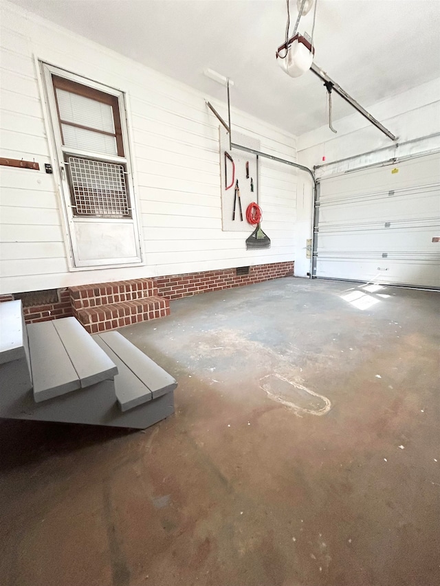 garage featuring a garage door opener