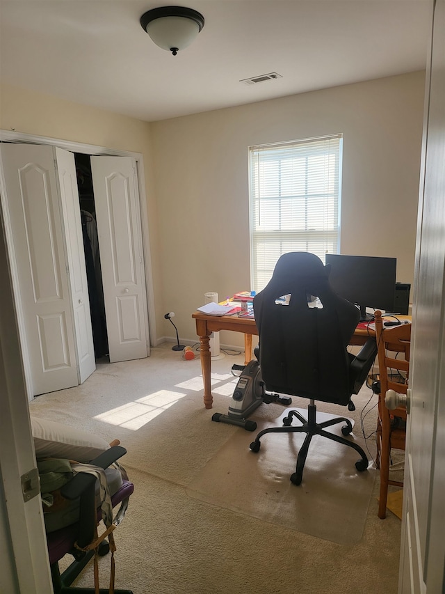 home office with light carpet