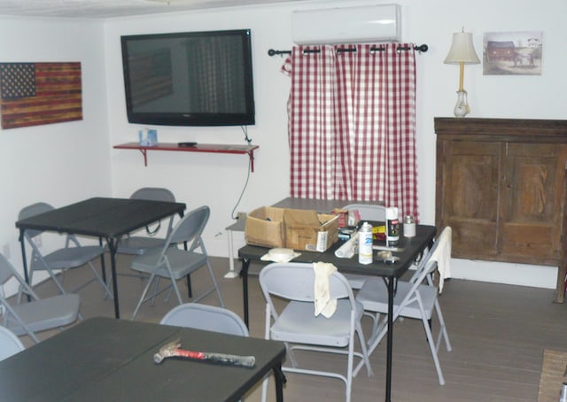 dining space with dark hardwood / wood-style flooring