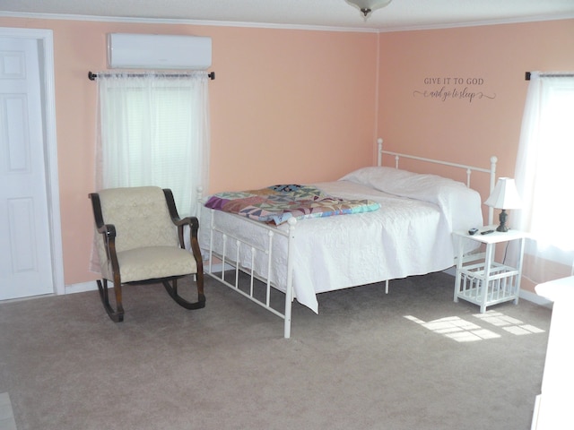 bedroom with carpet flooring, an AC wall unit, and ornamental molding