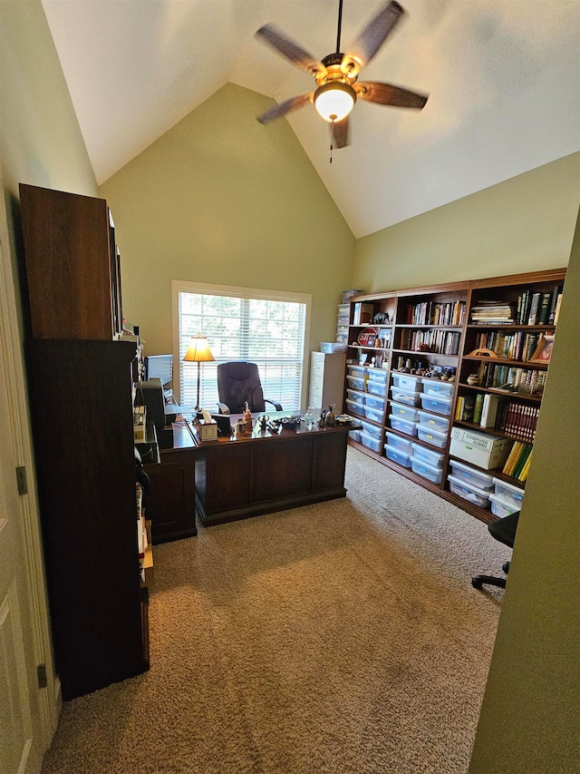 carpeted office featuring high vaulted ceiling and ceiling fan