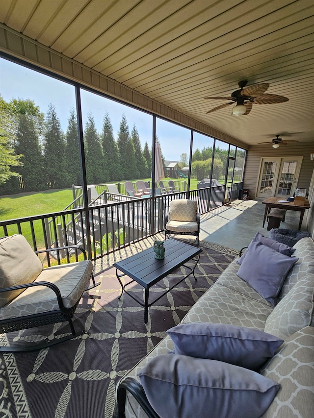 exterior space with ceiling fan and wooden ceiling