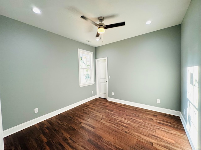 spare room featuring ceiling fan and wood-type flooring