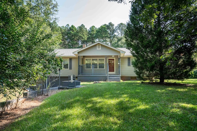 view of front of home featuring a front lawn