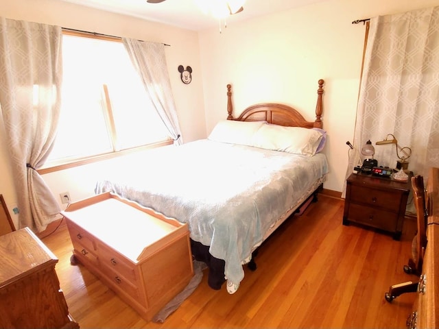 bedroom featuring light wood-style floors