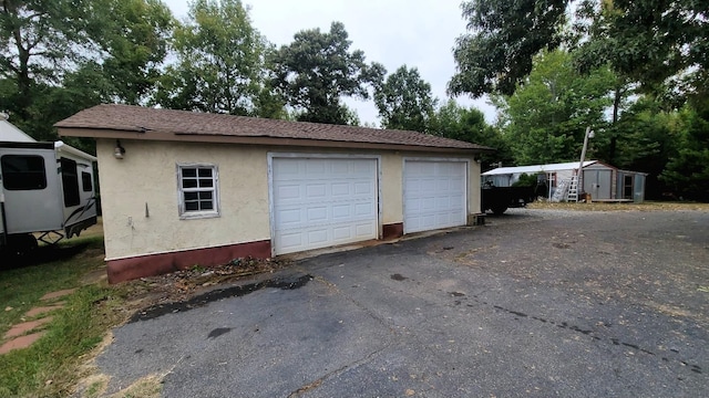 view of detached garage