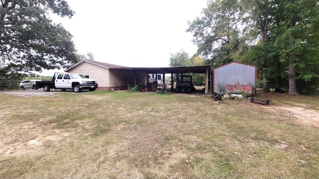 view of yard featuring a carport