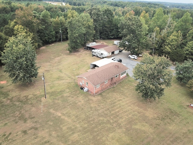 bird's eye view with a forest view