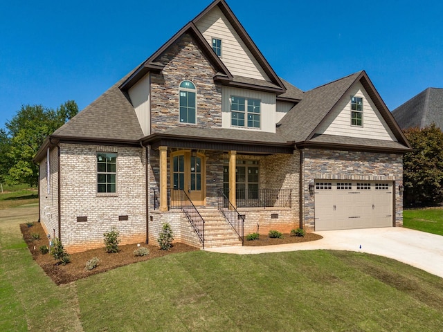 view of front of property with a porch, a front lawn, and a garage