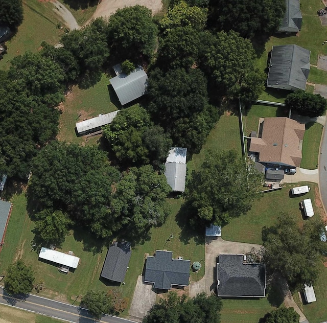 birds eye view of property with a residential view