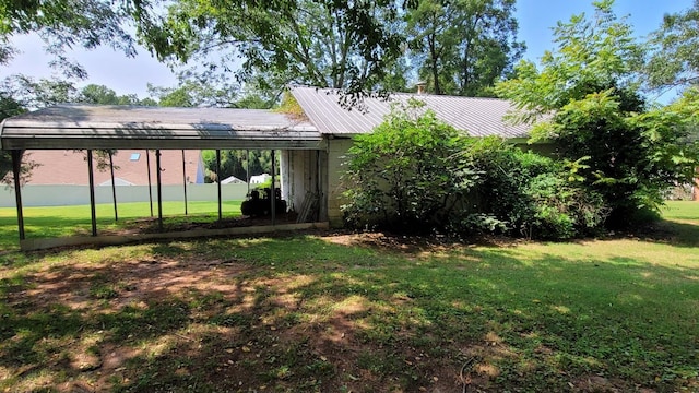 rear view of house with cooling unit, a lawn, and entry steps