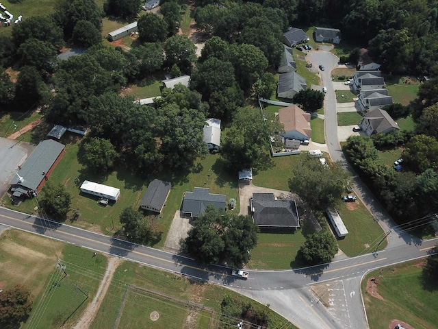birds eye view of property with a residential view