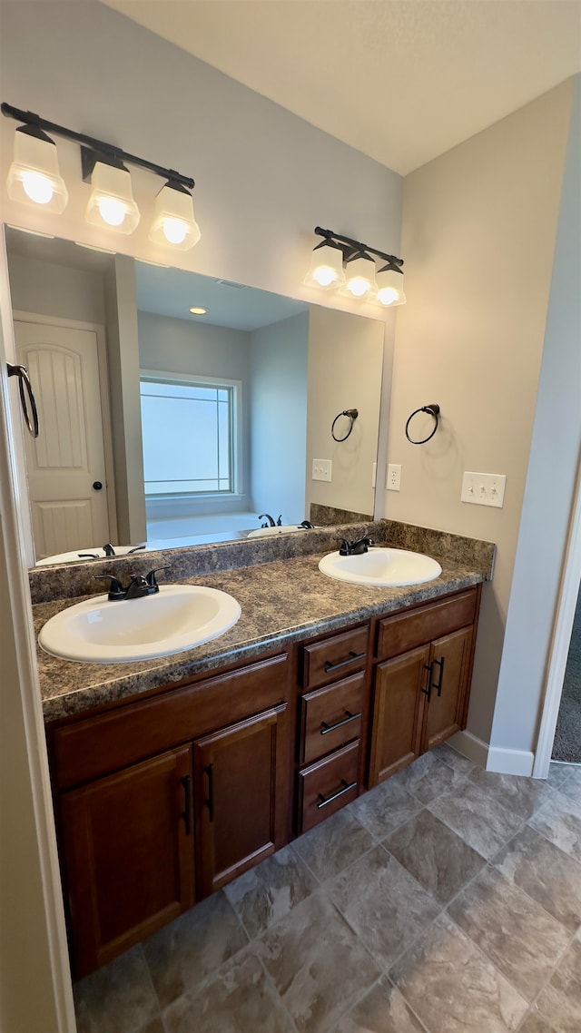 bathroom featuring vanity