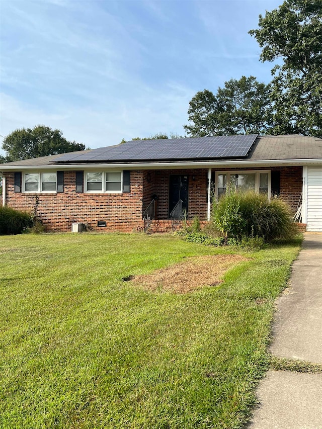 single story home with a front yard