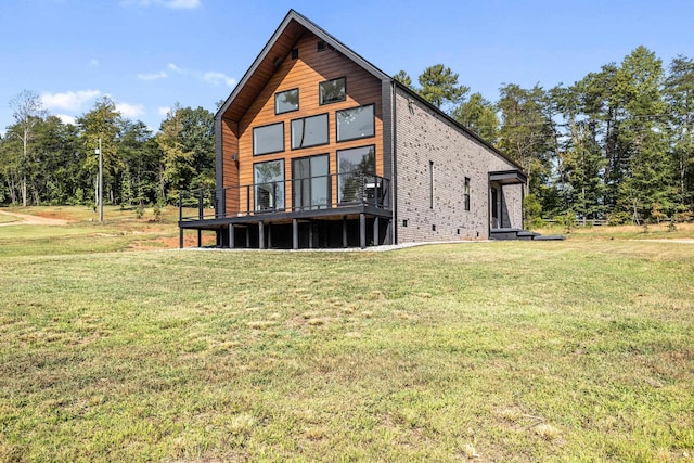 back of house featuring a yard