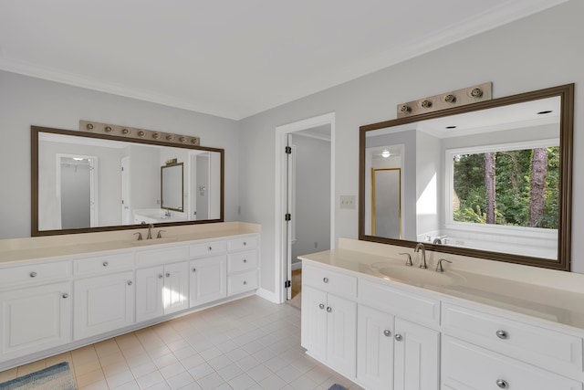 bathroom featuring vanity, tile patterned floors, and ornamental molding