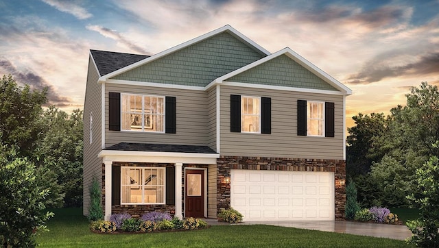 craftsman-style house with a garage and a yard