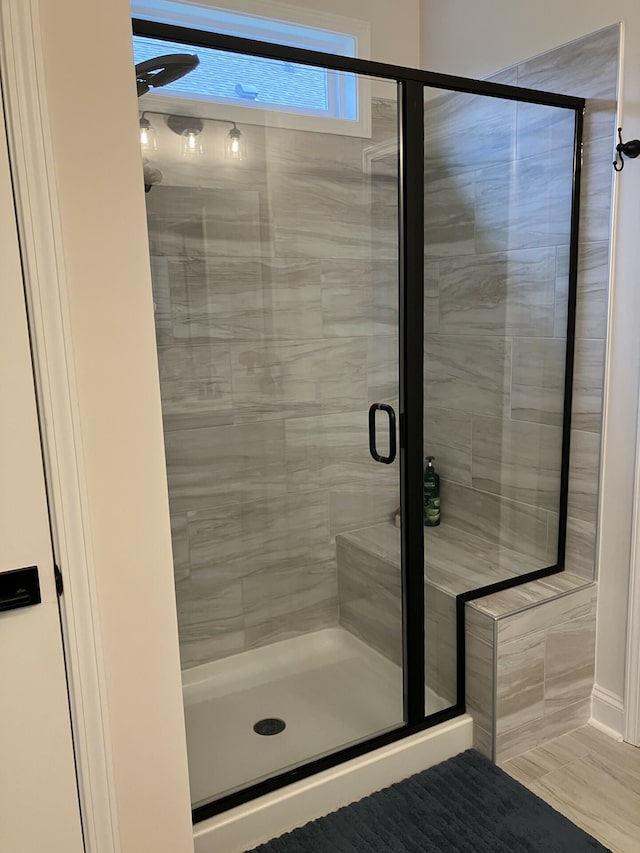 bathroom featuring walk in shower