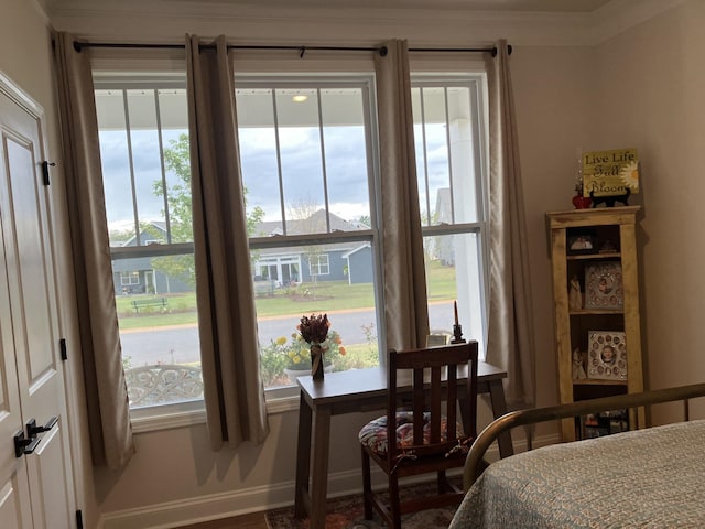 bedroom with ornamental molding