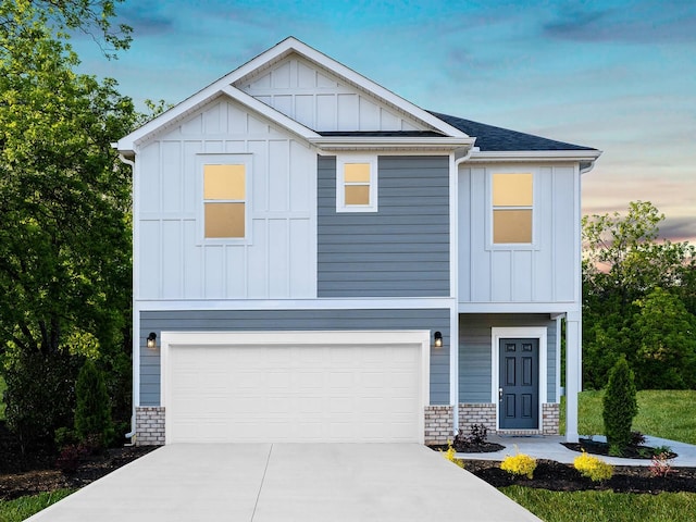 view of front of home with a garage