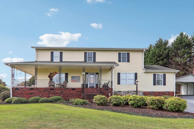 view of front of house with a porch and a front yard