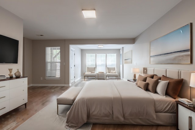 bedroom featuring hardwood / wood-style floors