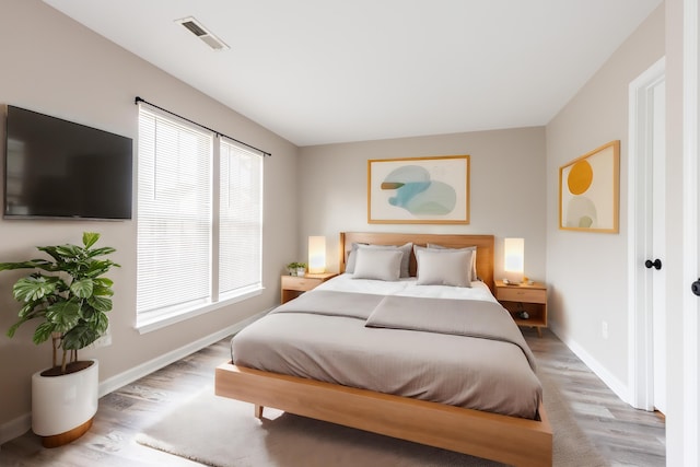 bedroom featuring light wood-type flooring