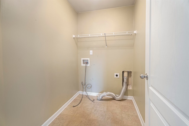 laundry area with hookup for a washing machine and hookup for an electric dryer