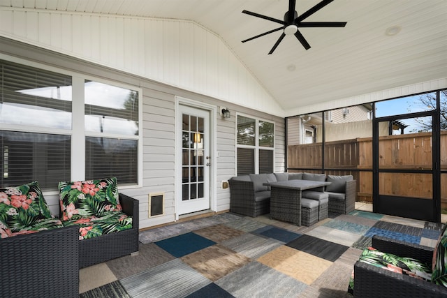 sunroom / solarium with ceiling fan, lofted ceiling, and wooden ceiling