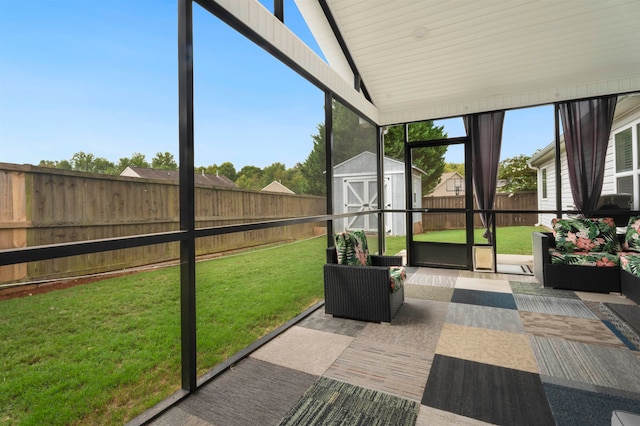 sunroom featuring wooden ceiling and lofted ceiling