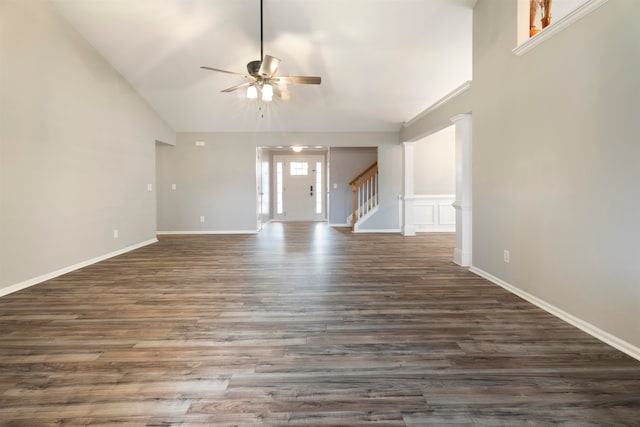 unfurnished living room with vaulted ceiling, ceiling fan, and dark hardwood / wood-style flooring