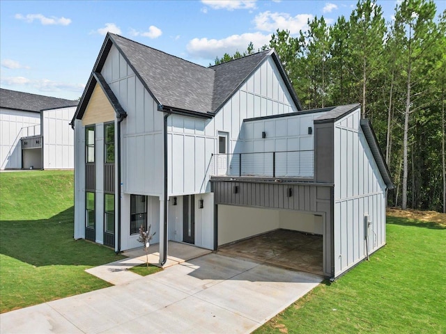 view of outbuilding with a lawn