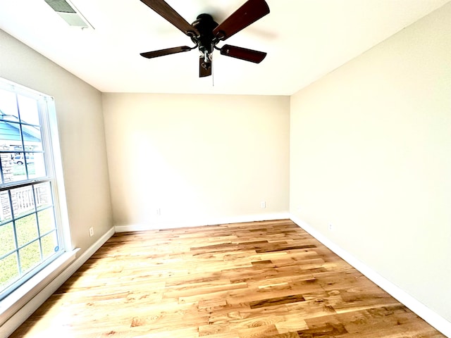 unfurnished room featuring ceiling fan and light hardwood / wood-style flooring