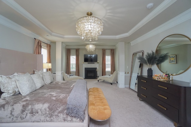 bedroom with multiple windows, a raised ceiling, ornamental molding, and light carpet