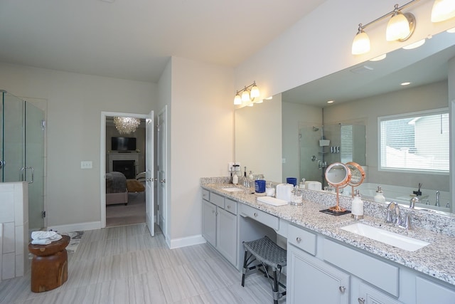 bathroom featuring independent shower and bath and vanity