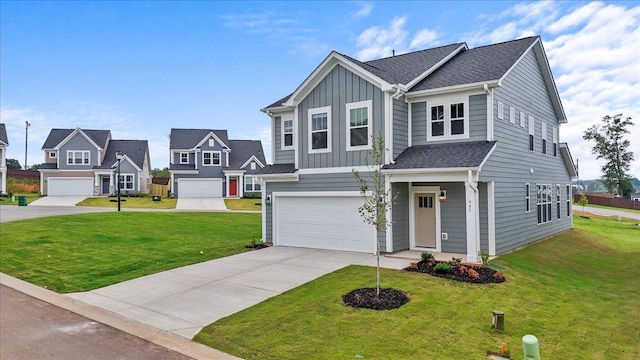 view of front of property with a garage and a front yard