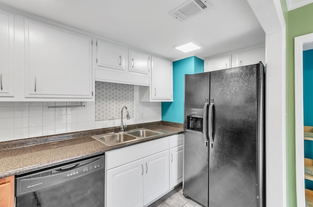 kitchen featuring black appliances, tasteful backsplash, sink, and white cabinets