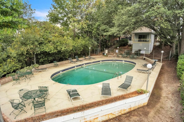 view of pool with a patio