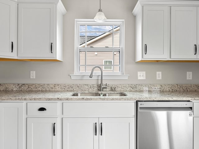 kitchen with dishwasher, hanging light fixtures, sink, and white cabinetry