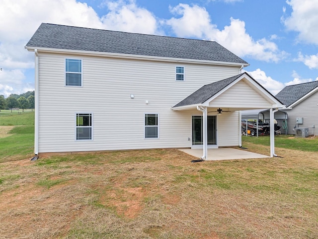 back of house with ceiling fan, cooling unit, a yard, and a patio area