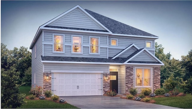 craftsman-style house featuring a garage