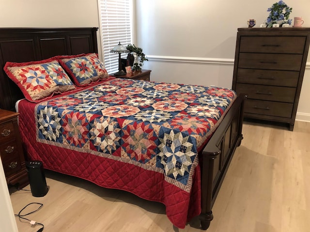 bedroom featuring light wood-type flooring