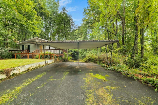 view of parking with a carport