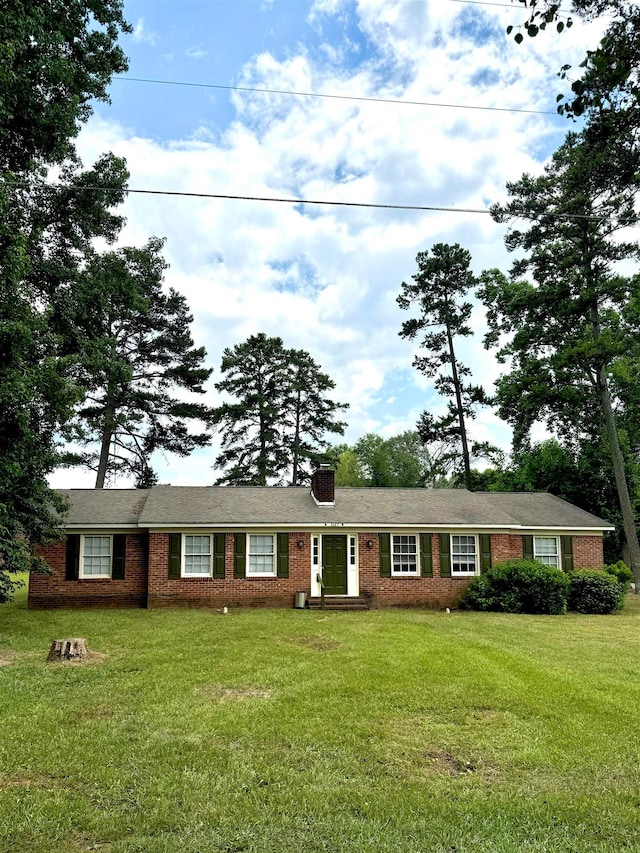 ranch-style house with a front yard