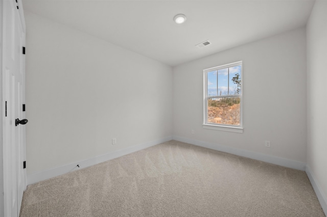 empty room featuring carpet floors