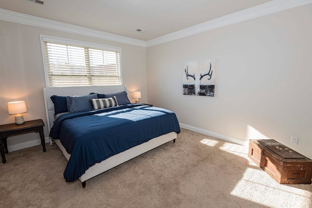 carpeted bedroom featuring crown molding