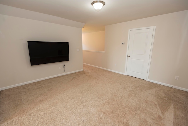 unfurnished living room with light carpet